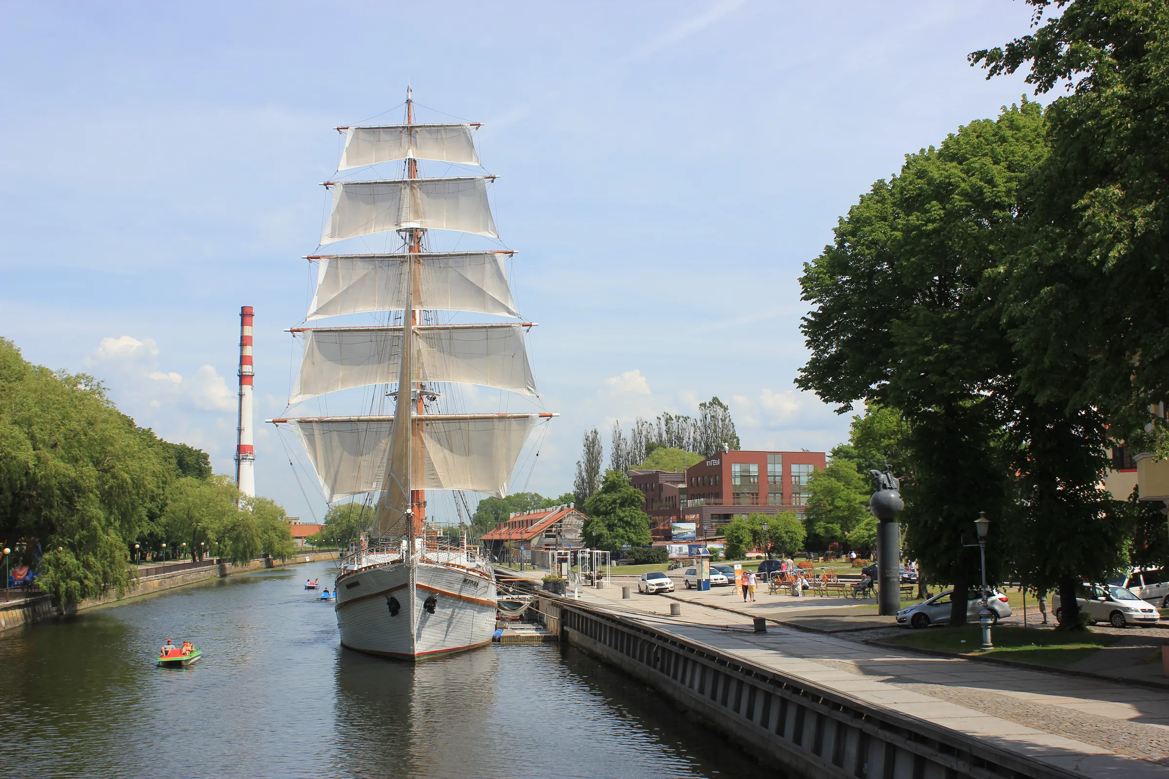 The tall ship Meridianas under full sail on the river Danė